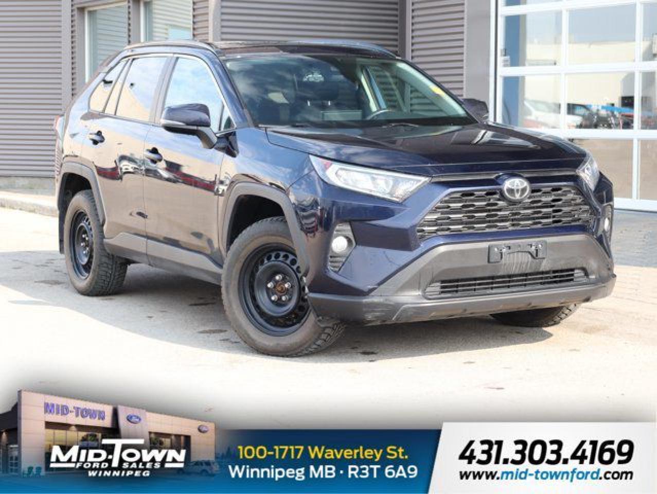 Recent Arrival!<br /><br />| One Owner, | Local Trade, | Clean Carfax, | Non Smoker, | Apple Carplay, | Android Auto, AWD, Cloth, 17 Alloy Wheels, 3.177 Axle Ratio, 4-Wheel Disc Brakes, 6 Speakers, ABS brakes, Air Conditioning, Alloy wheels, AM/FM radio, Apple CarPlay/Android Auto, Auto High-beam Headlights, Automatic temperature control, Brake assist, Bumpers: body-colour, Cloth Seat Trim, Connected Services by Toyota, Delay-off headlights, Driver door bin, Driver vanity mirror, Dual front impact airbags, Dual front side impact airbags, Electronic Stability Control, Emergency communication system: Safety Connect (Connected Services by Toyota), Exterior Parking Camera Rear, Four wheel independent suspension, Front anti-roll bar, Front Bucket Seats, Front dual zone A/C, Front fog lights, Front reading lights, Fully automatic headlights, Heated door mirrors, Heated Front Bucket Seats, Heated front seats, Heated steering wheel, Illuminated entry, Knee airbag, Occupant sensing airbag, Outside temperature display, Overhead airbag, Overhead console, Panic alarm, Passenger door bin, Passenger vanity mirror, Power door mirrors, Power driver seat, Power Liftgate, Power moonroof, Power steering, Power windows, Radio: Audio Plus, Rain sensing wipers, RAV4 XLE Grade, Rear anti-roll bar, Rear window defroster, Remote keyless entry, Roof rack: rails only, Speed control, Speed-sensing steering, Split folding rear seat, Spoiler, Steering wheel mounted audio controls, Tachometer, Telescoping steering wheel, Tilt steering wheel, Traction control, Trip computer, Turn signal indicator mirrors, Variably intermittent wipers.<br /><br />Blue 2020 Toyota RAV4 XLE CLEAN CARFAX, LOCAL TRADE AWD 2.5L 4-Cylinder DOHC 8-Speed Automatic<br /><br /><br />For further information please contact MidTown Ford sales department directly at 204-284-7650. Dealer #9695.<br /><br /><br />Awards:<br />* ALG Canada Residual Value Awards