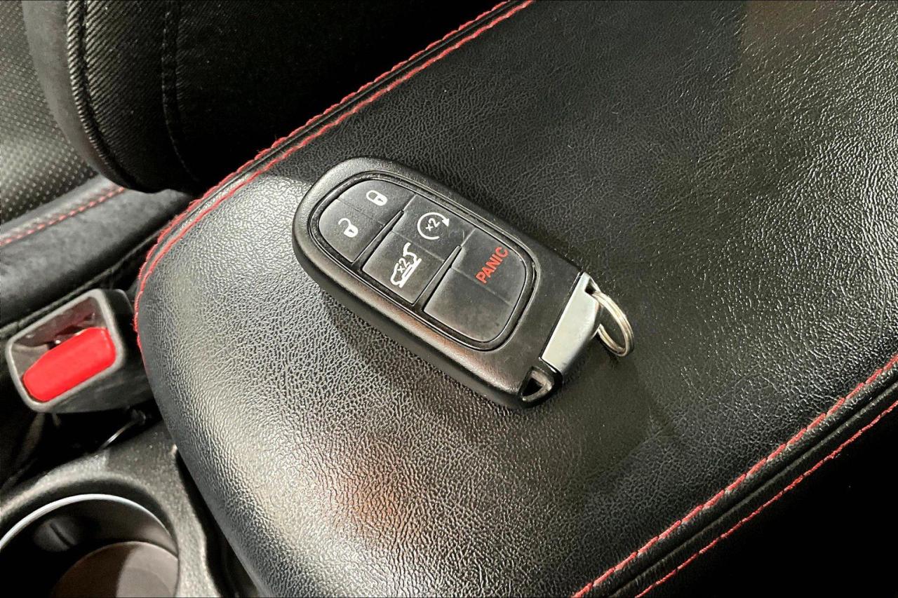 12565709