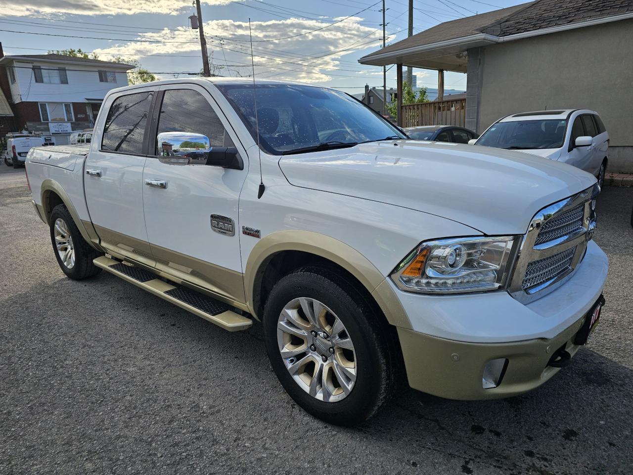2017 RAM 1500 4WD Crew Cab 140.5" Longhorn, - Photo #3