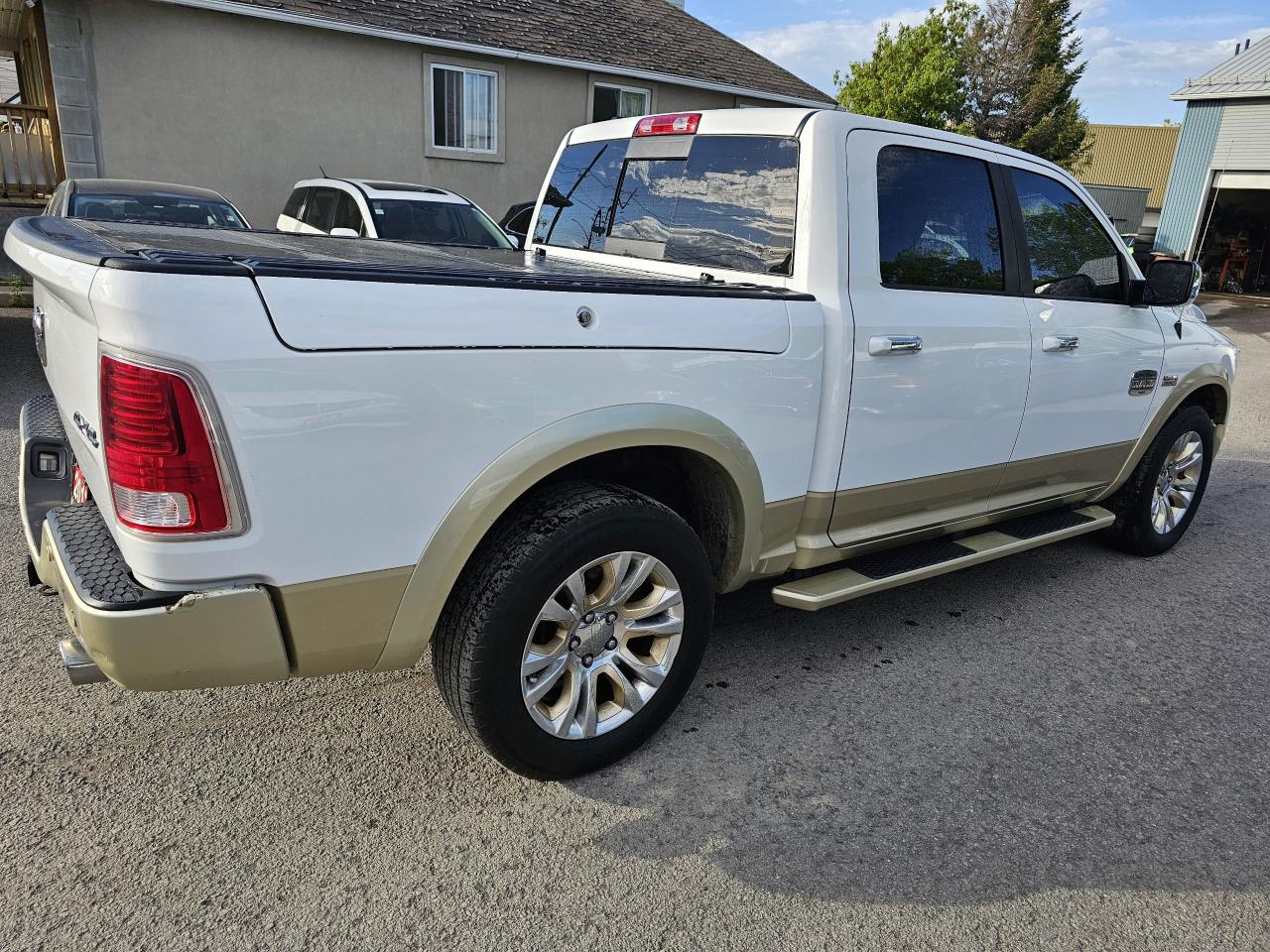 2017 RAM 1500 4WD Crew Cab 140.5" Longhorn, - Photo #4