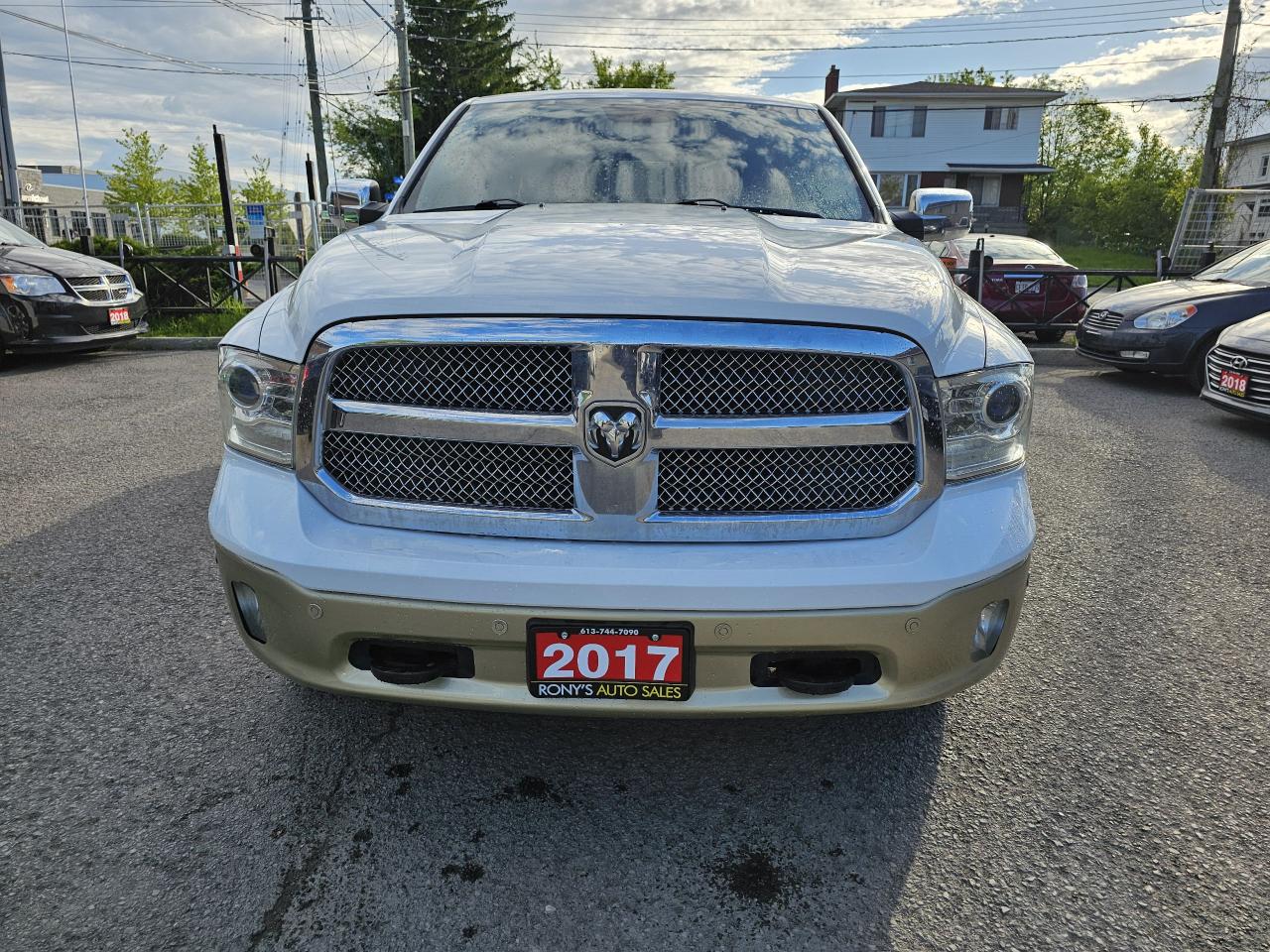 2017 RAM 1500 4WD Crew Cab 140.5" Longhorn, - Photo #2