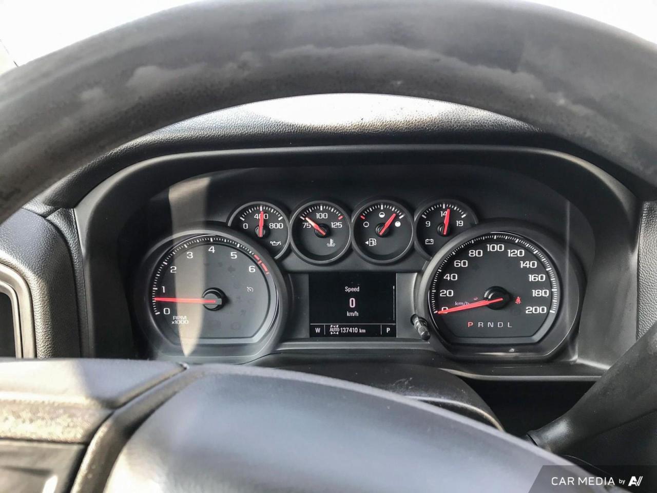 12566633