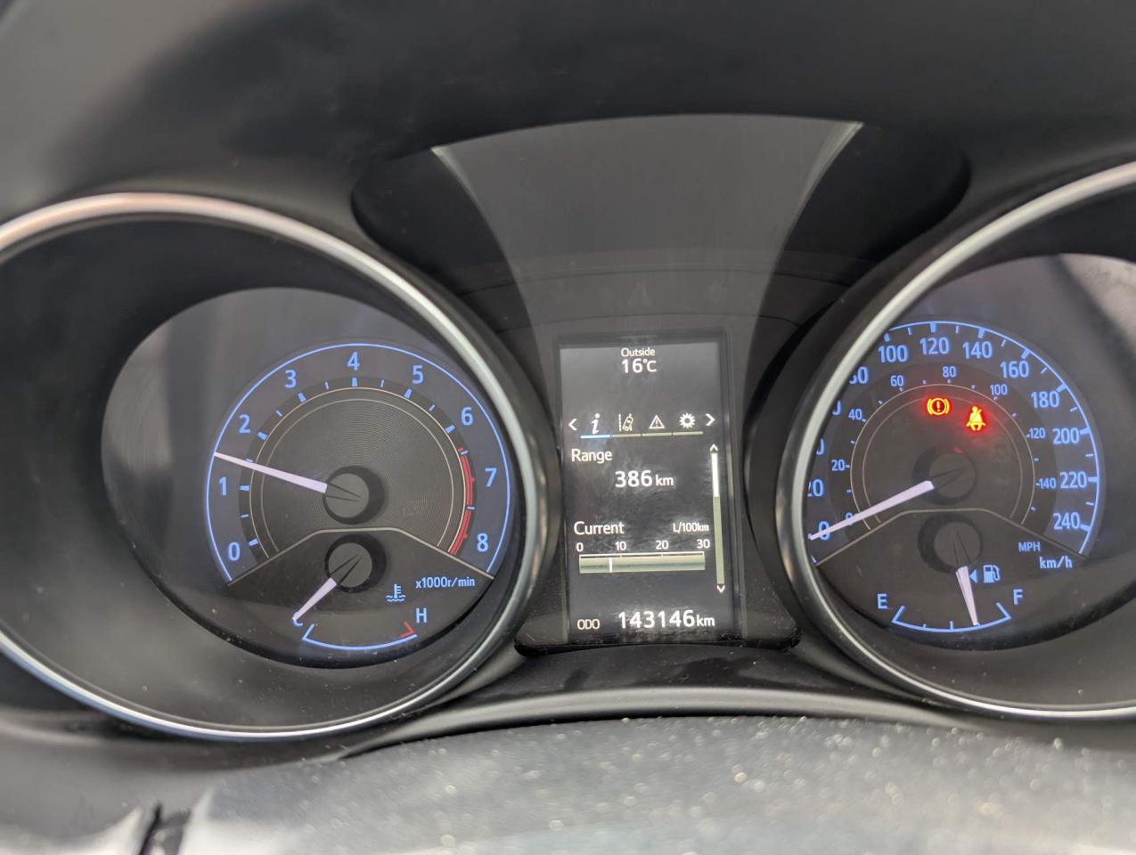 12567140