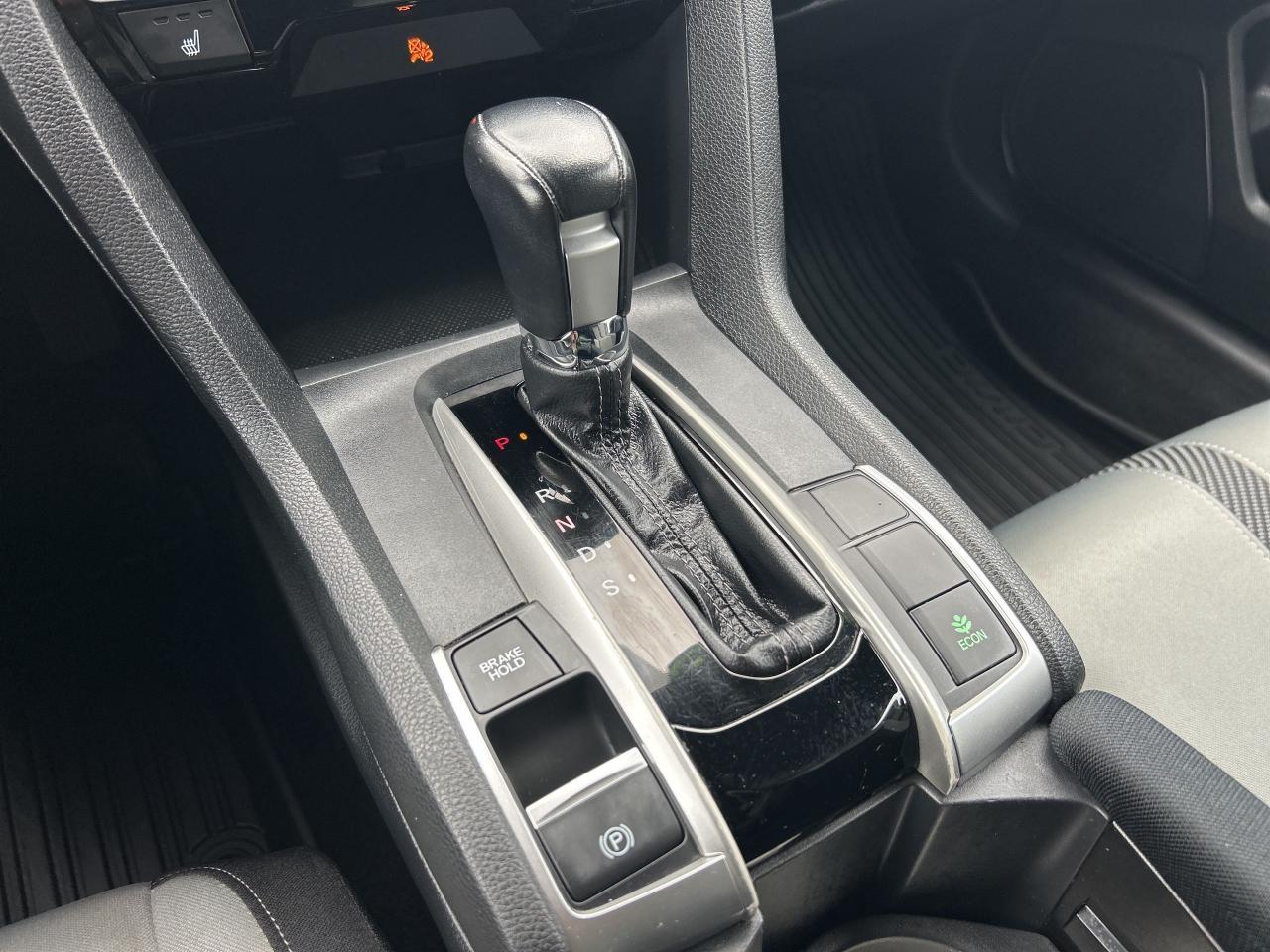 12567371