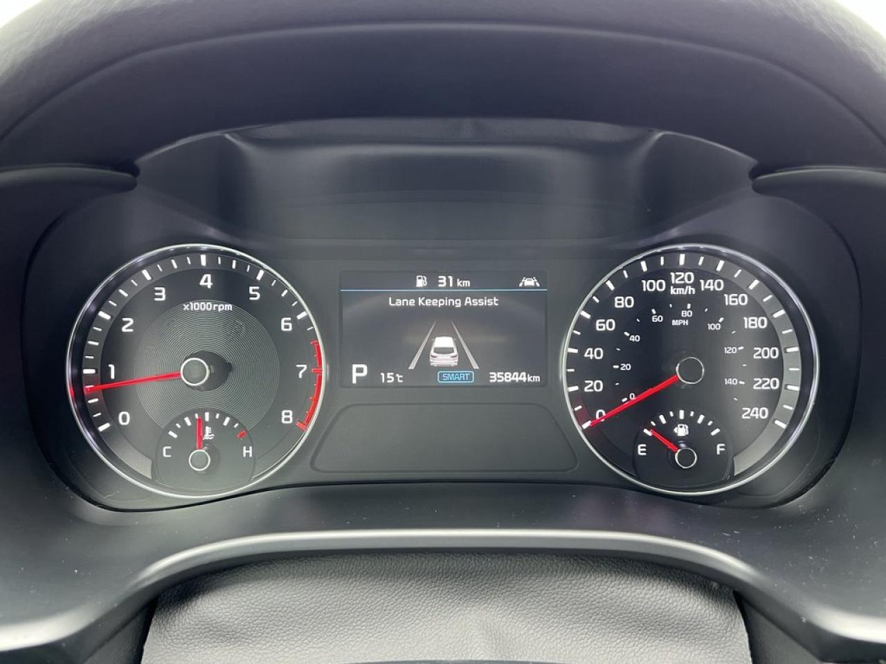 12567638