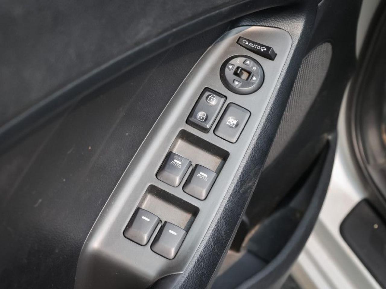 12567779