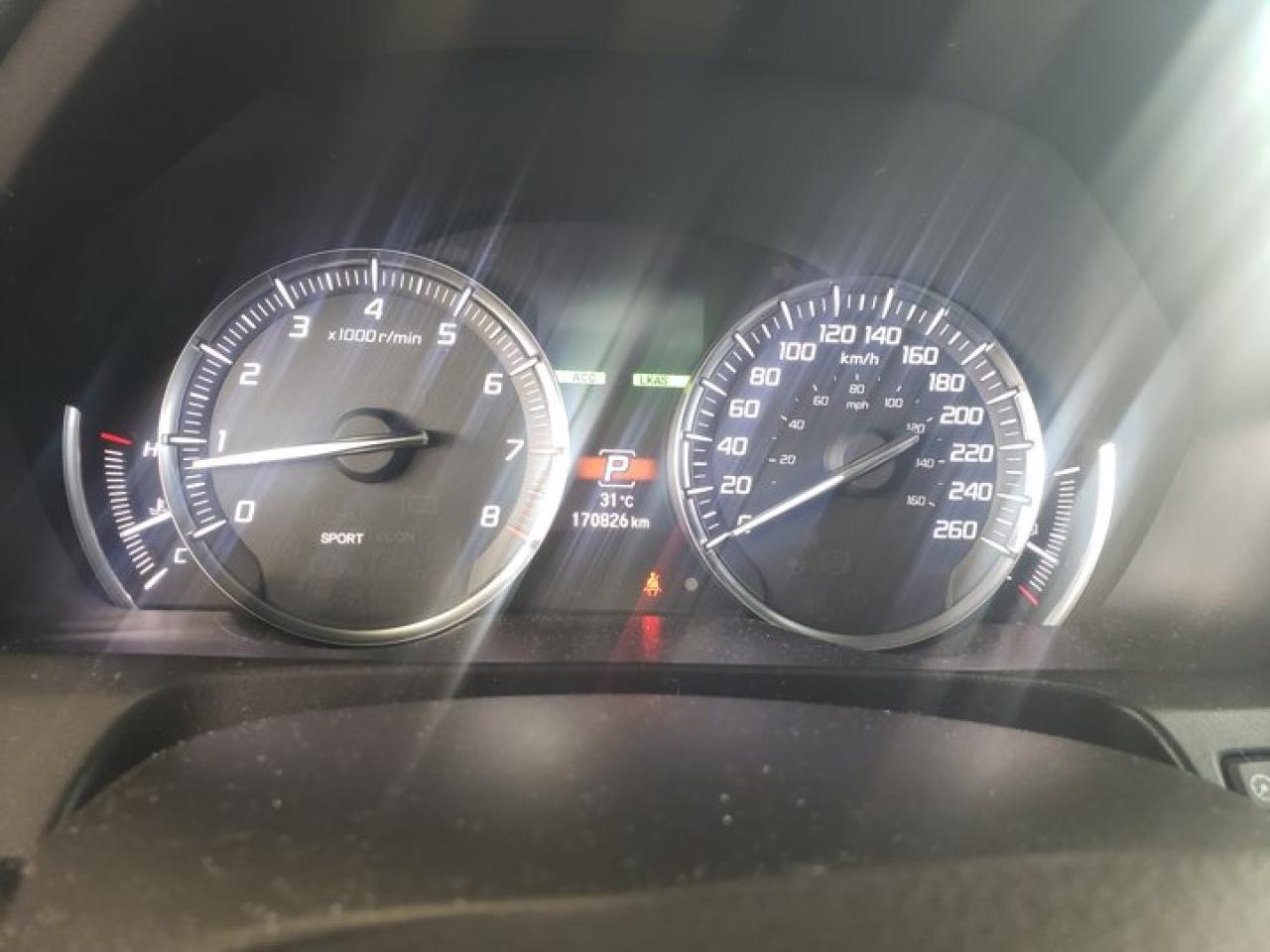 12567812