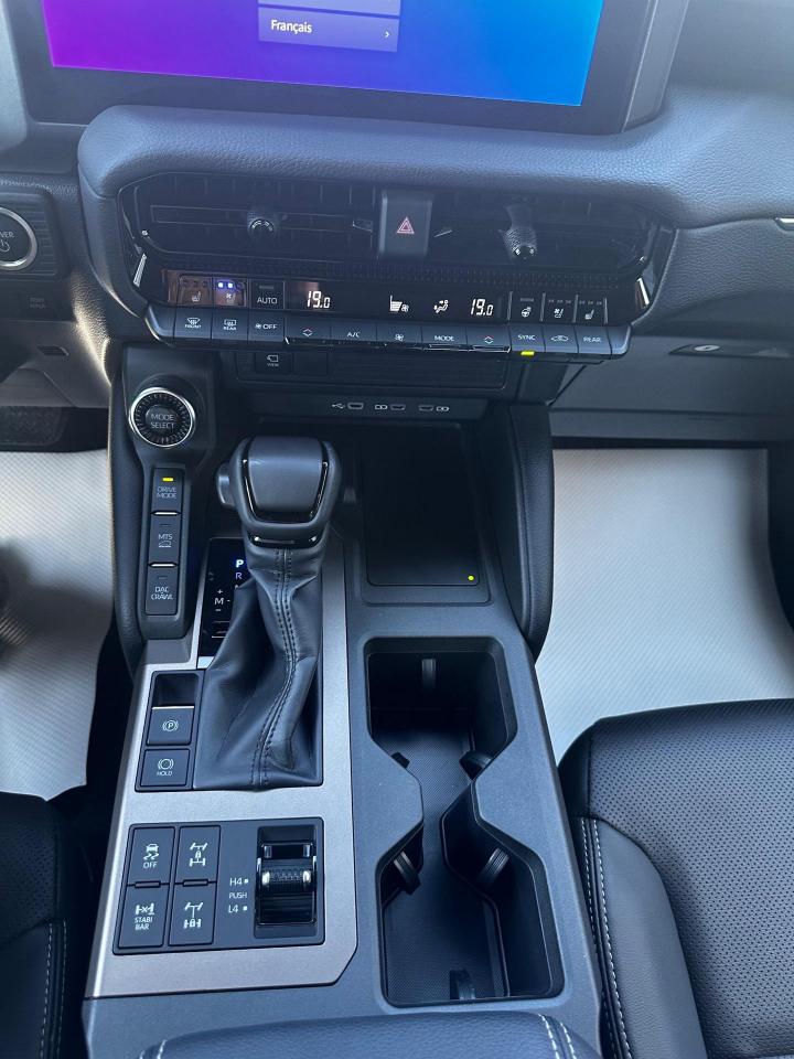 12568610