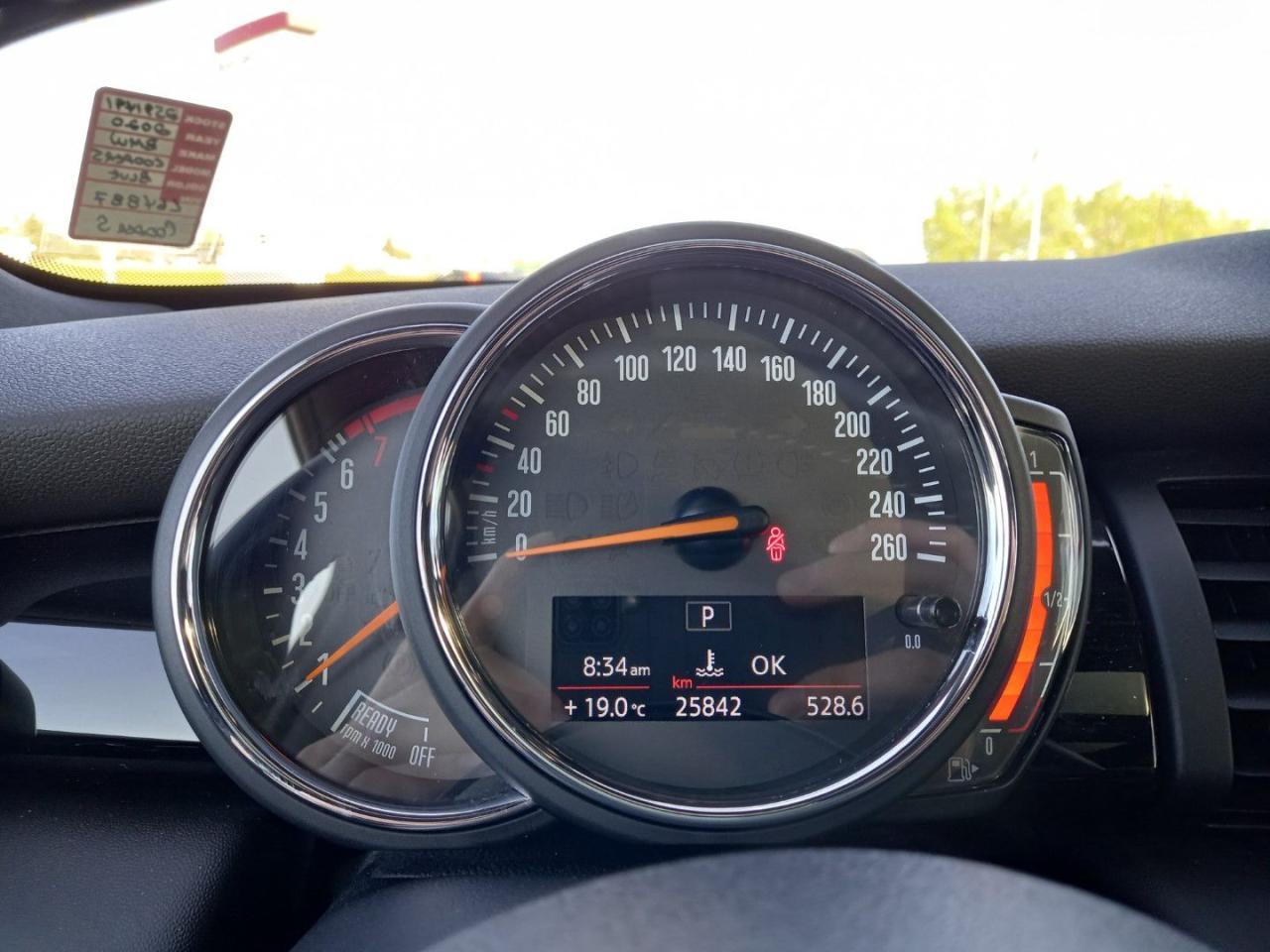 12568730