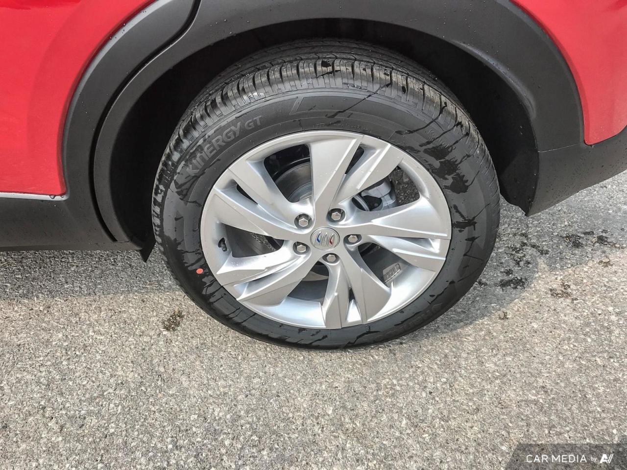 12570425