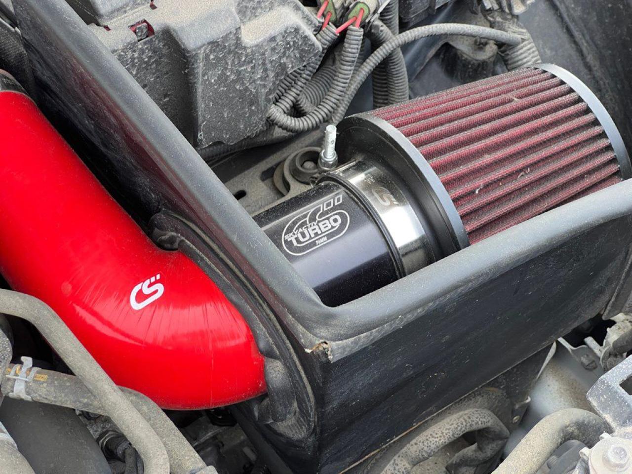 12570503