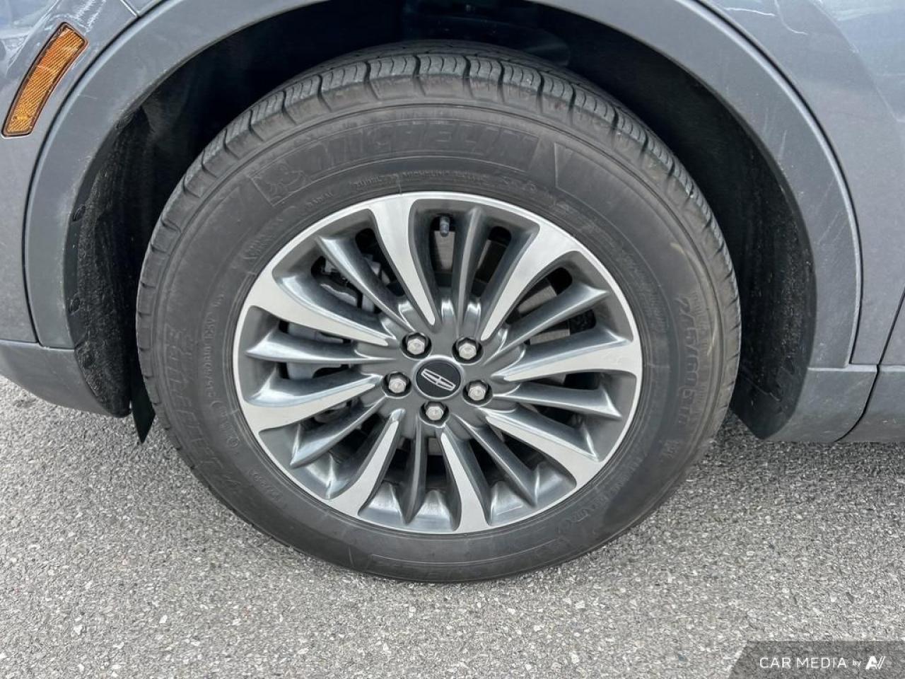 12571160