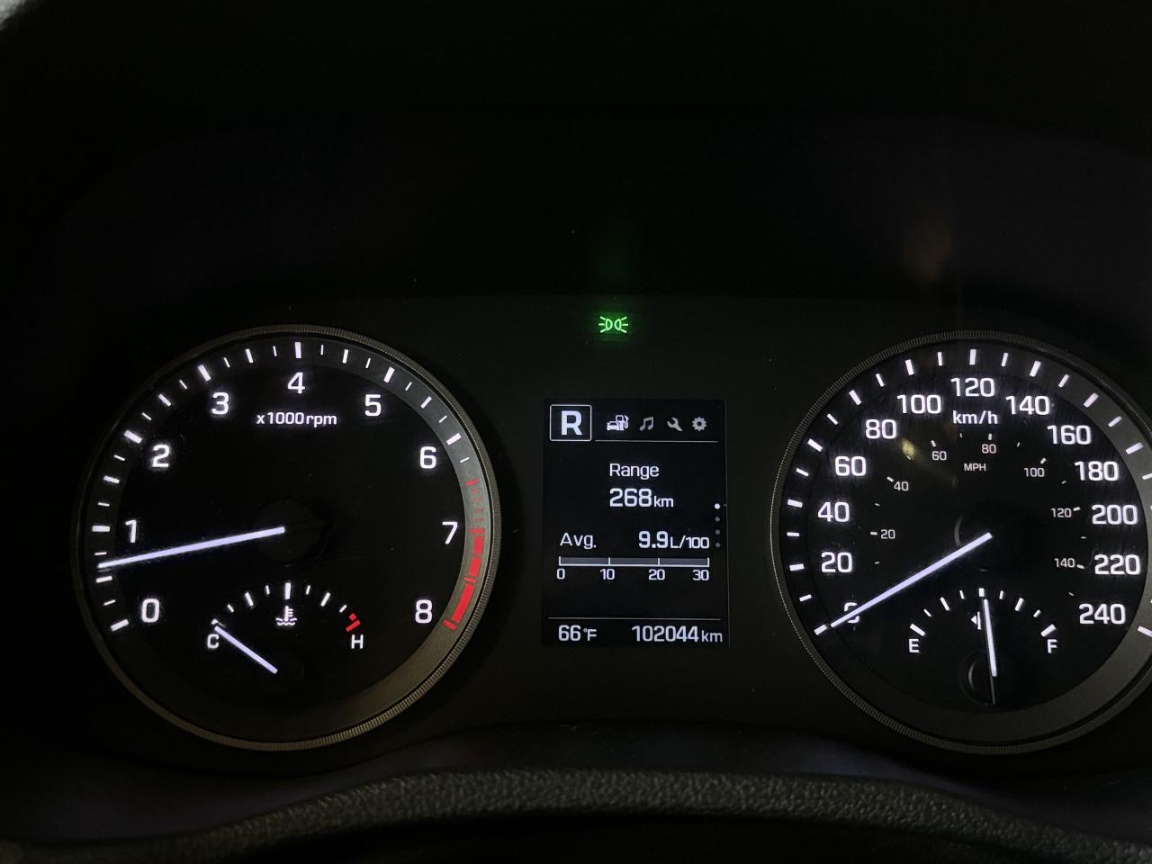12571445