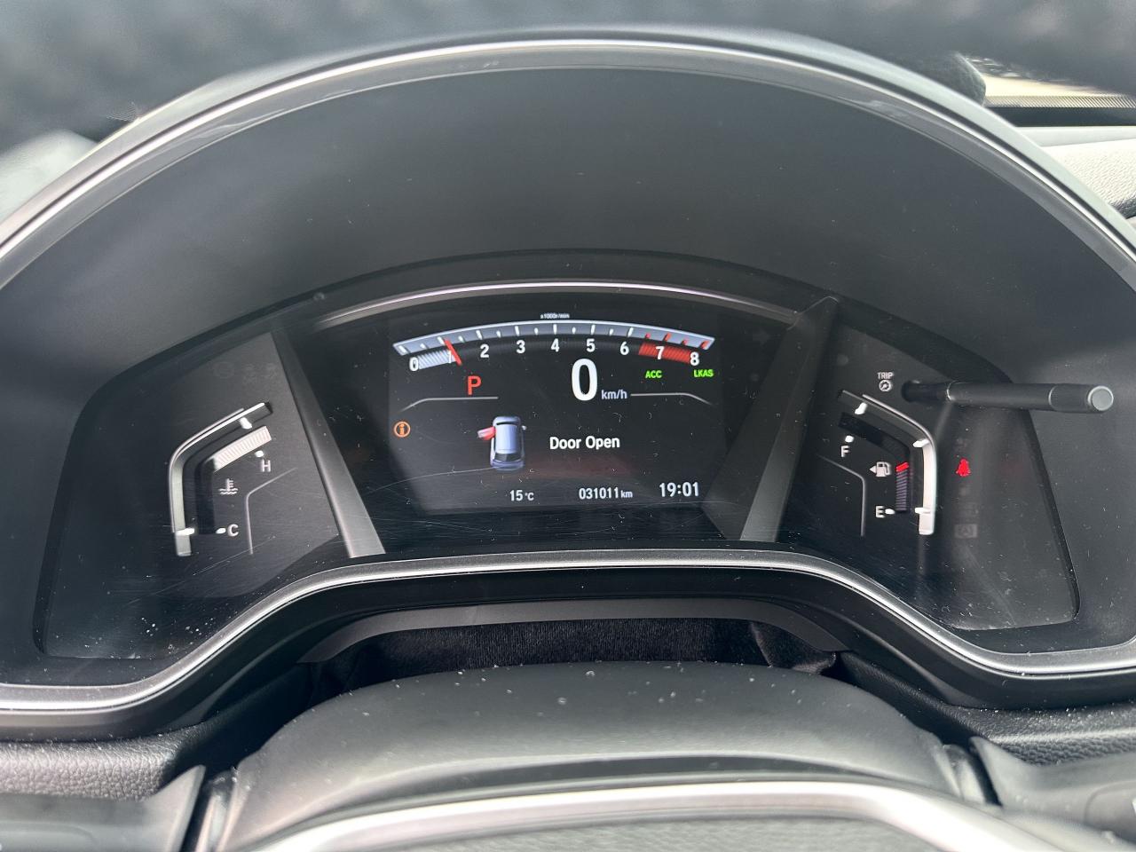 12571610