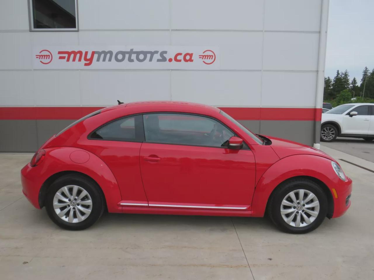 2014 Volkswagen Beetle Coupe TDI Comfortline (**LOW LOW KMS ON THIS SWEET BUG!!!**CLEAN CARFAX**DIESEL**ALLOY RIMS**AUTOMATIC** POWER WINDOWS**POWER LOCKS**BLUETOOTH**AM/FM/CD PLAYER**HEATED SEATS**) Photo