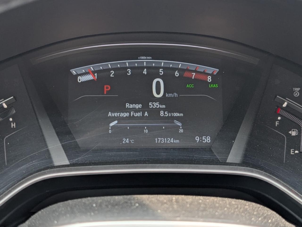 12571877