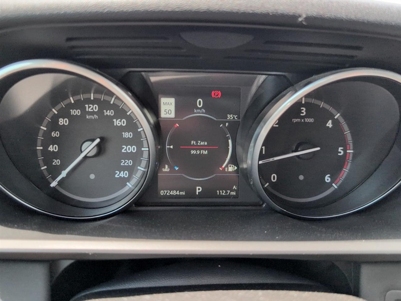 12571880