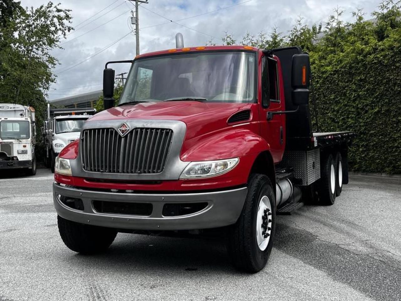 2011 International 4400 22 Foot Flat Deck With Air Brakes Diesel, 7.6L, 6 cylinder, 2 door, 4X2, air conditioning, AM/FM radio, red exterior, grey interior, vinyl. CVI Certification decal valid until May 2026.  $38,830.00 plus $375 processing fee, $39,205.00 total payment obligation before taxes.  Listing report, warranty, contract commitment cancellation fee, financing available on approved credit (some limitations and exceptions may apply). All above specifications and information is considered to be accurate but is not guaranteed and no opinion or advice is given as to whether this item should be purchased. We do not allow test drives due to theft, fraud, acts of vandalism and undetectable impaired driving. Instead we provide the following benefits: Complimentary Warranty (with options to extend), Limited Money Back Satisfaction Guarantee on Fully Completed Contracts, Contract Commitment Cancellation, and an Open-Ended Sell-Back Option. Ask seller for details or call 604-522-REPO(7376) to confirm listing availability.