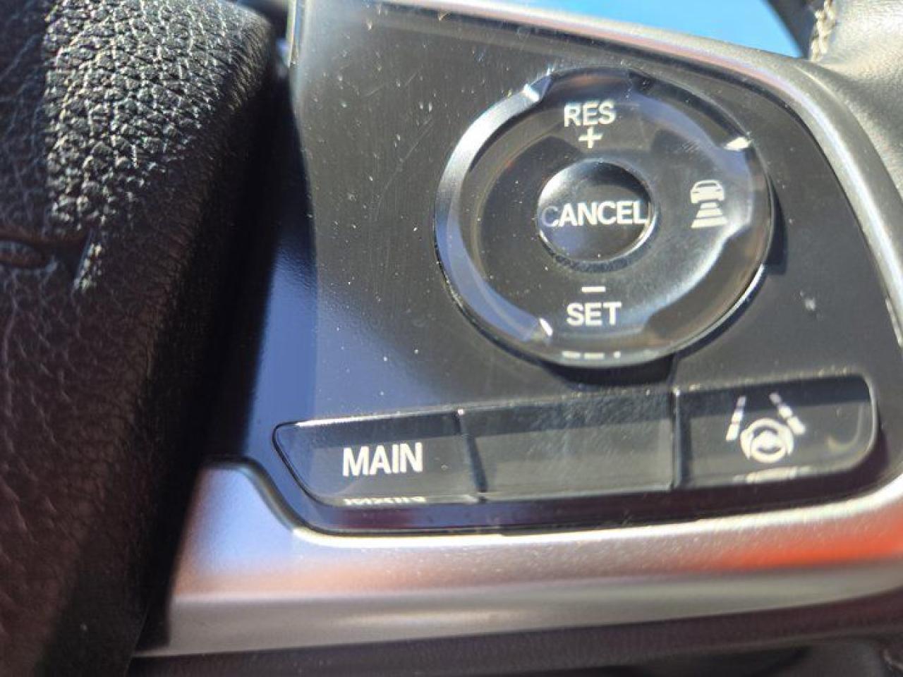 12572318