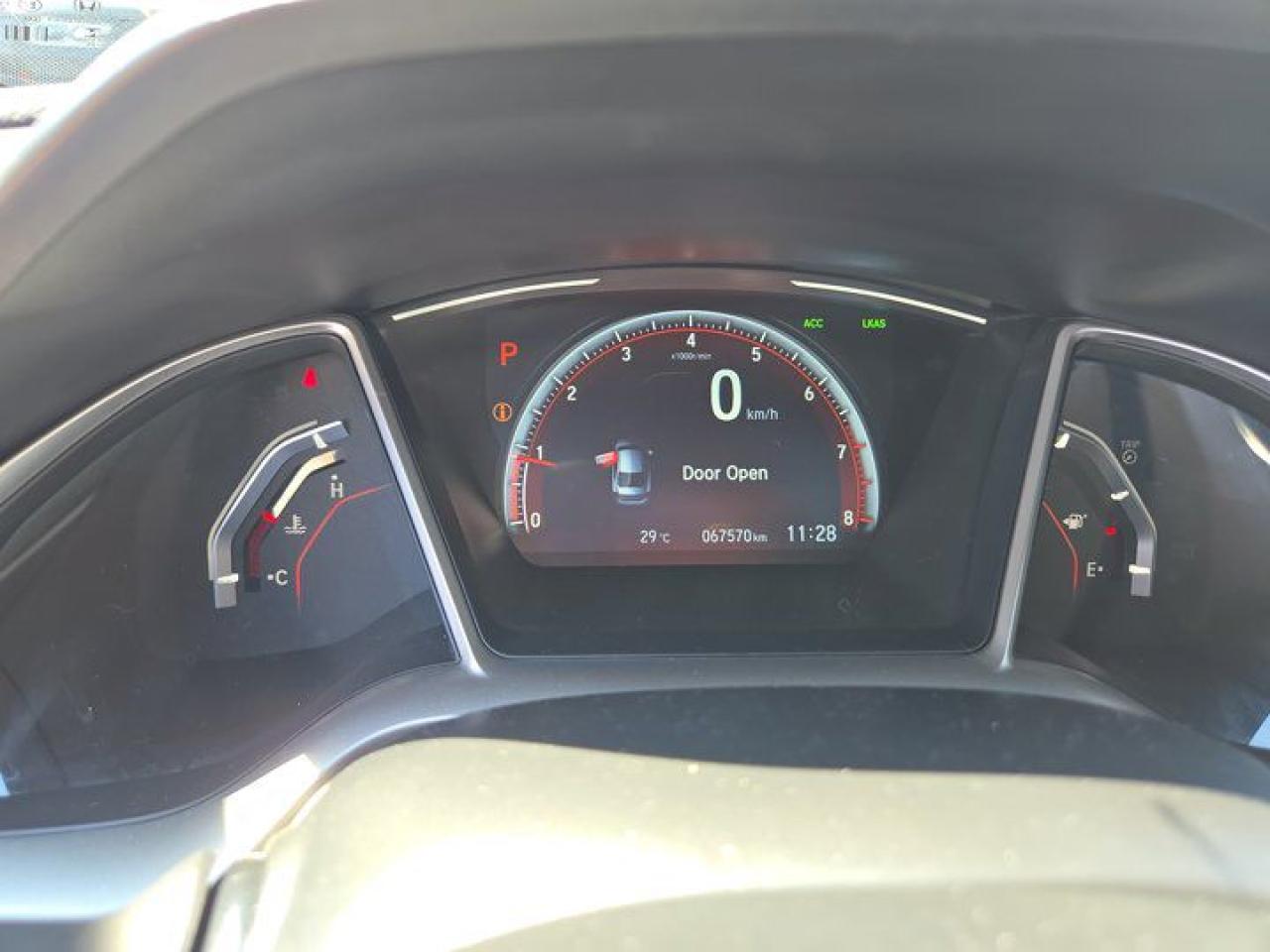 12572318