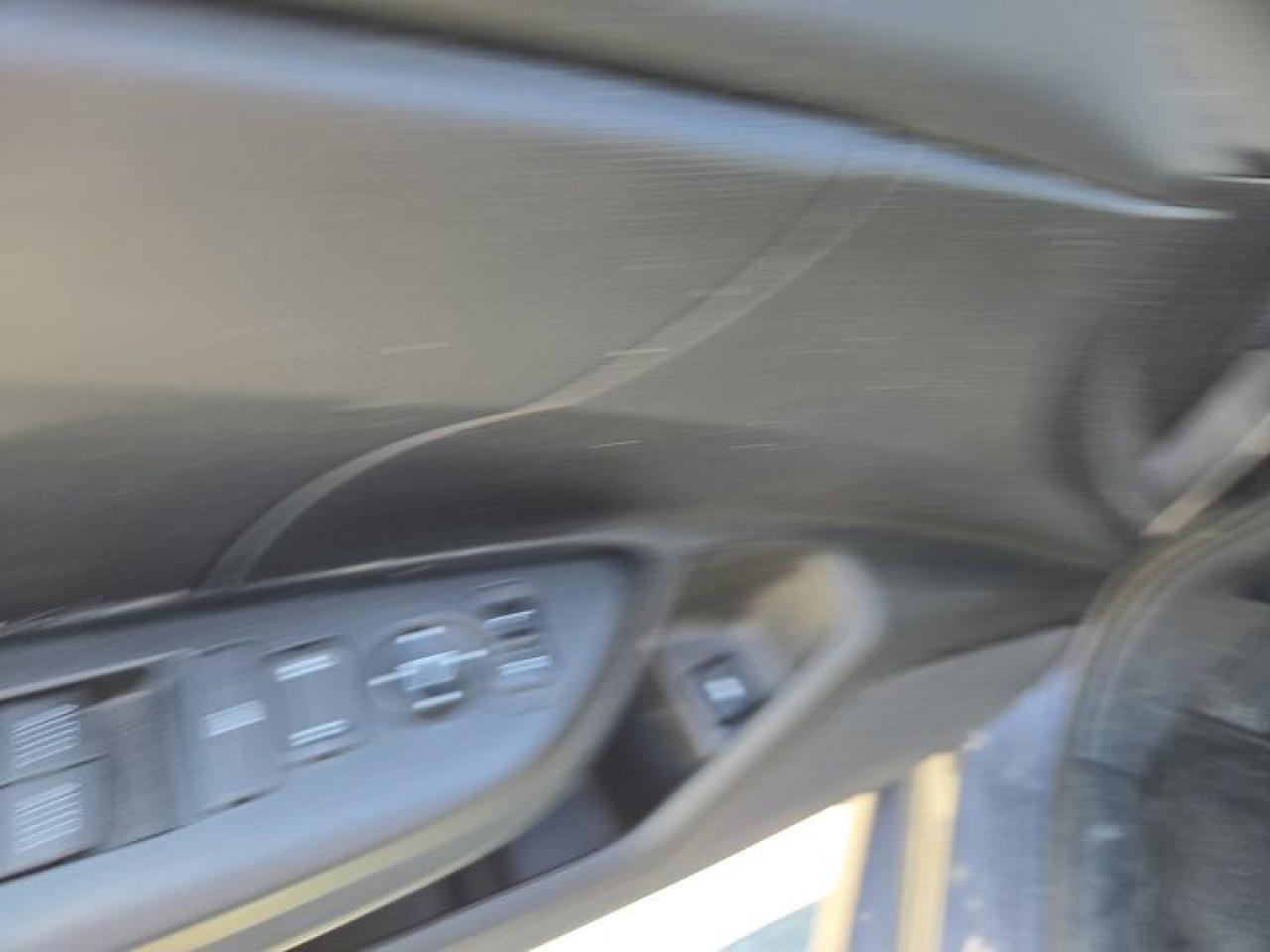 12572327