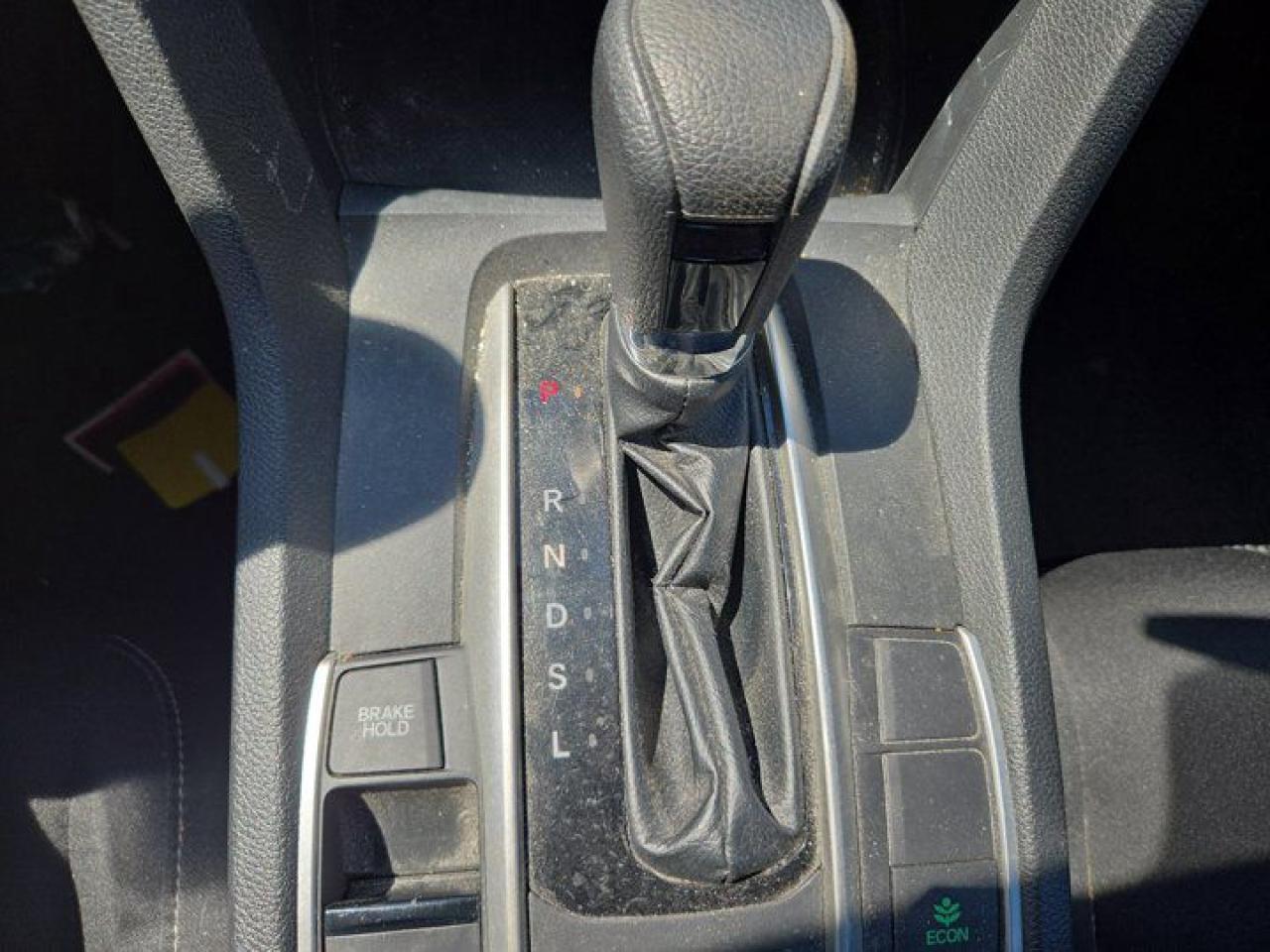 12572327
