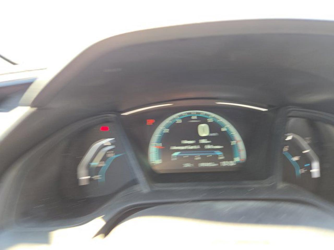 12572327