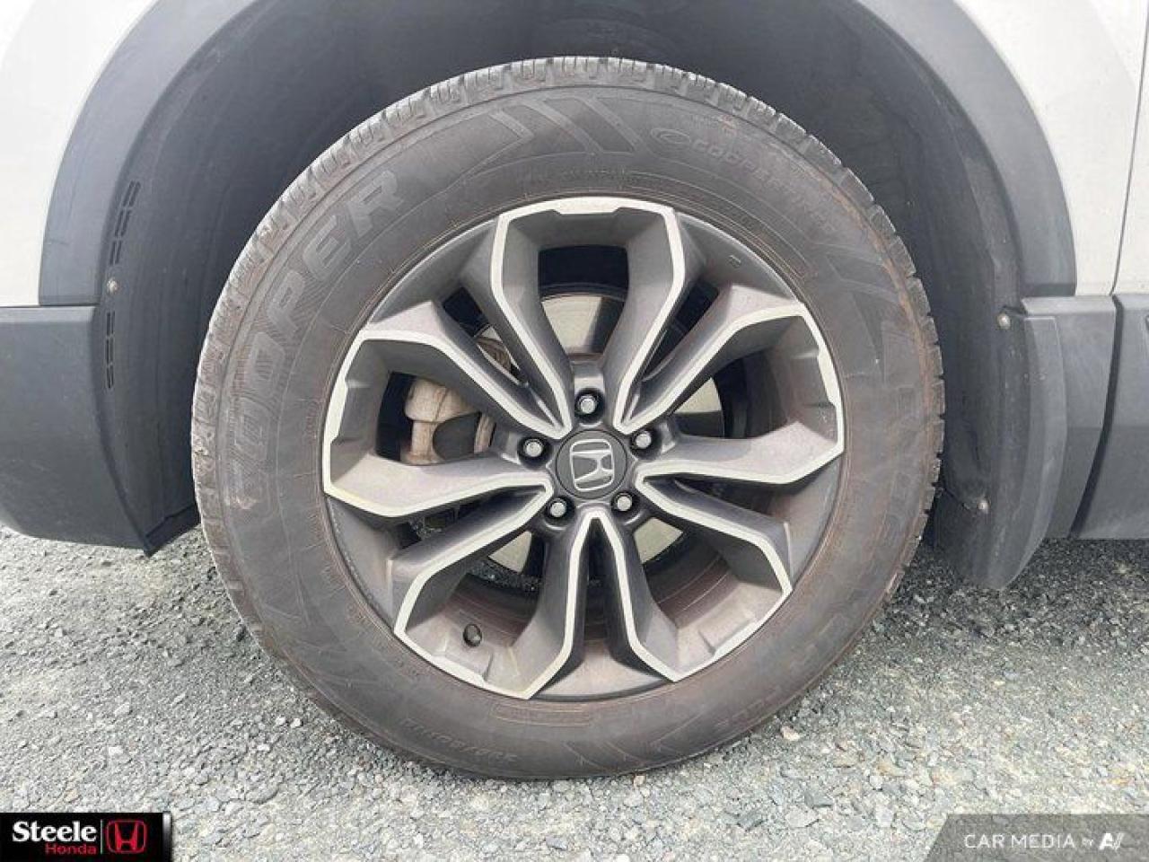 12572411