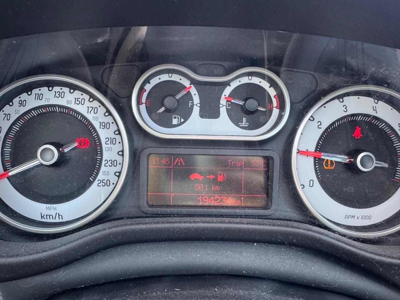 12572588