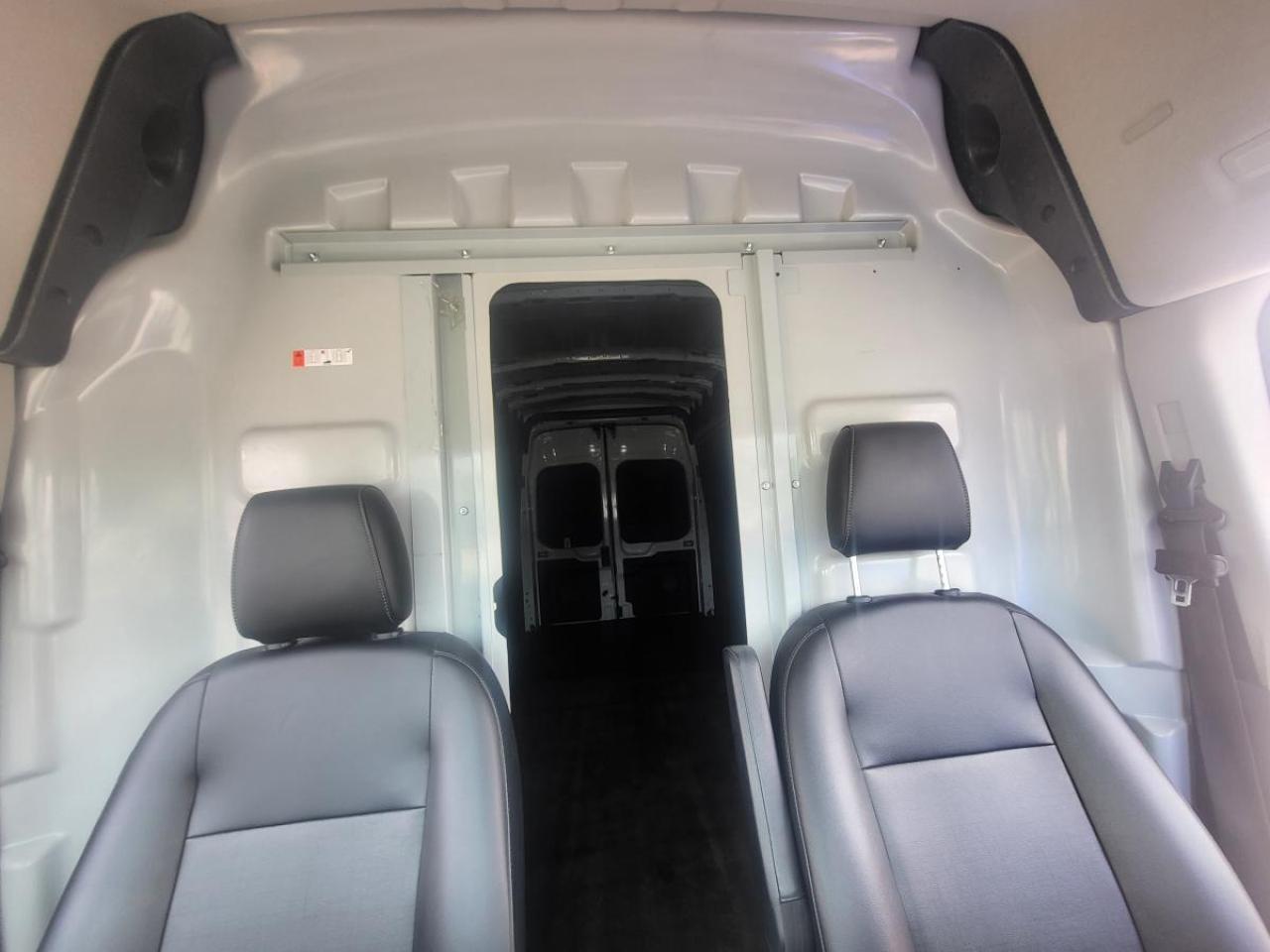 2023 Ford Transit Cargo Van T-250 148" EL Hi Rf 9070 GVWR RWD Photo