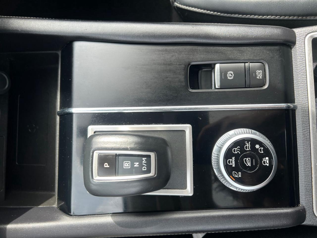 12573875
