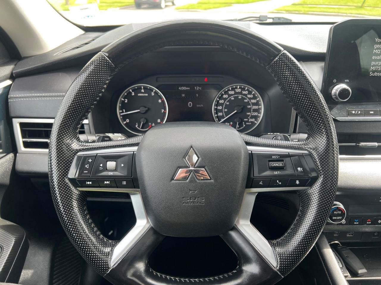 12573875