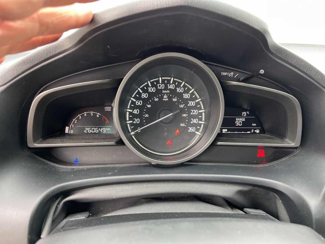 12574571
