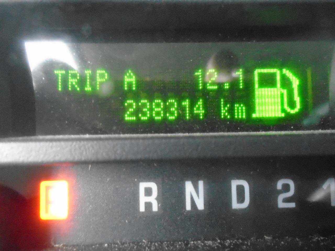 12575702