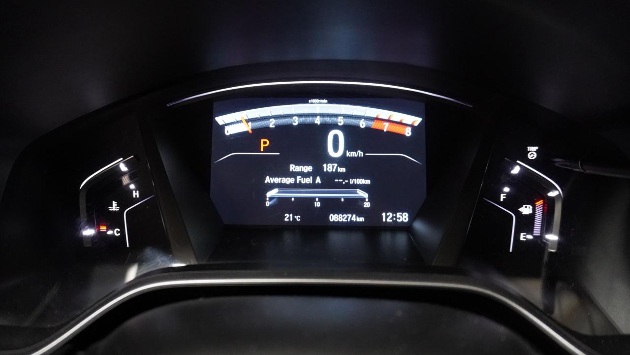 12575837