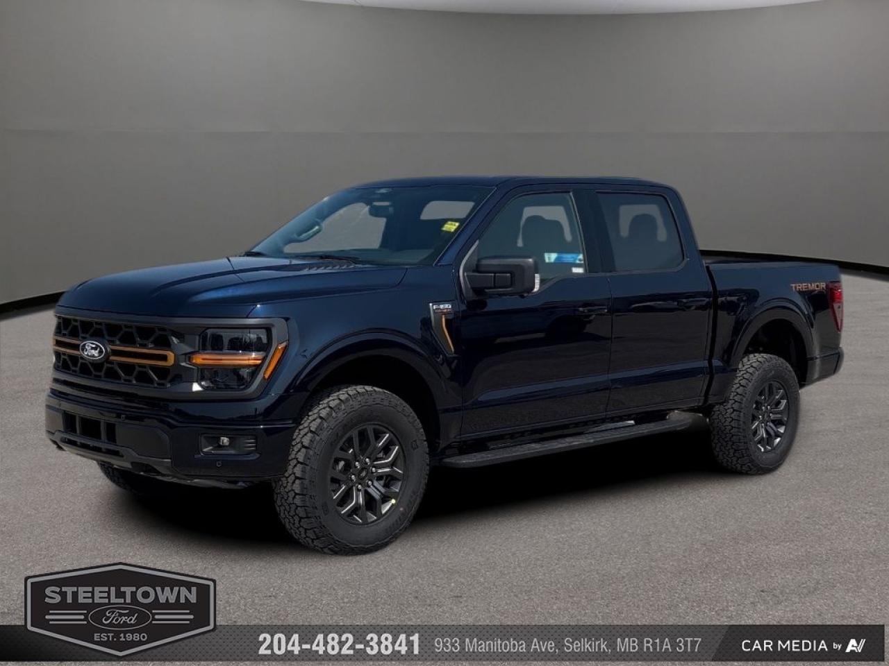 <b>Off-Road Package,  Heated Seats,  Climate Control,  Aluminum Wheels,  Running Boards!</b><br> <br> <br> <br>We value your TIME, we wont waste it or your gas is on us!   We offer extended test drives and if you cant make it out to us we will come straight to you!<br> <br>  Smart engineering, impressive tech, and rugged styling make the F-150 hard to pass up. <br> <br>Just as you mold, strengthen and adapt to fit your lifestyle, the truck you own should do the same. The Ford F-150 puts productivity, practicality and reliability at the forefront, with a host of convenience and tech features as well as rock-solid build quality, ensuring that all of your day-to-day activities are a breeze. Theres one for the working warrior, the long hauler and the fanatic. No matter who you are and what you do with your truck, F-150 doesnt miss.<br> <br> This antimatter blue metallic Crew Cab 4X4 pickup   has an automatic transmission and is powered by a  400HP 5.0L 8 Cylinder Engine.<br> <br> Our F-150s trim level is Tremor. Upgrading to this Ford F-150 Tremor is a great choice as it comes loaded with exclusive aluminum wheels, a performance off-road suspension, a dual stainless steel exhaust with black tip, front fog lights, remote keyless entry and remote engine start, Ford Co-Pilot360 that features lane keep assist, pre-collision assist and automatic emergency braking. Enhanced features include body colored exterior accents, SYNC 4 with enhanced voice recognition, Apple CarPlay and Android Auto, FordPass Connect 4G LTE, steering wheel mounted cruise control, a powerful audio system, trailer hitch and sway control, cargo box lights, power door locks and a rear view camera to help when backing out of a tight spot. This vehicle has been upgraded with the following features: Off-road Package,  Heated Seats,  Climate Control,  Aluminum Wheels,  Running Boards,  Remote Start,  Sync. <br><br> View the original window sticker for this vehicle with this url <b><a href=http://www.windowsticker.forddirect.com/windowsticker.pdf?vin=1FTFW4L55SFB24823 target=_blank>http://www.windowsticker.forddirect.com/windowsticker.pdf?vin=1FTFW4L55SFB24823</a></b>.<br> <br>To apply right now for financing use this link : <a href=http://www.steeltownford.com/?https://CreditOnline.dealertrack.ca/Web/Default.aspx?Token=bf62ebad-31a4-49e3-93be-9b163c26b54c&La target=_blank>http://www.steeltownford.com/?https://CreditOnline.dealertrack.ca/Web/Default.aspx?Token=bf62ebad-31a4-49e3-93be-9b163c26b54c&La</a><br><br> <br/> Total  rebate of $6000 is reflected in the price.   Incentives expire 2025-06-02.  See dealer for details. <br> <br>Family owned and operated in Selkirk for 35 Years.  <br>Steeltown Ford is located just 20 minutes North of the Perimeter Hwy, with an onsite banking center that offers free consultations. <br>Ask about our special dealer rates available through all major banks and credit unions.<br>Dealer retains all rebates, plus taxes, govt fees and Steeltown Protect Plus.<br>Steeltown Ford Protect Plus includes:<br>- Life Time Tire Warranty <br>Dealer Permit # 1039<br><br><br> Come by and check out our fleet of 100+ used cars and trucks and 190+ new cars and trucks for sale in Selkirk.  o~o
