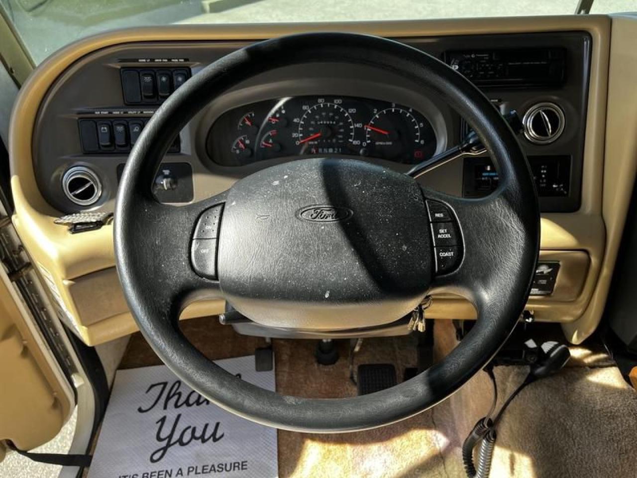 12576323