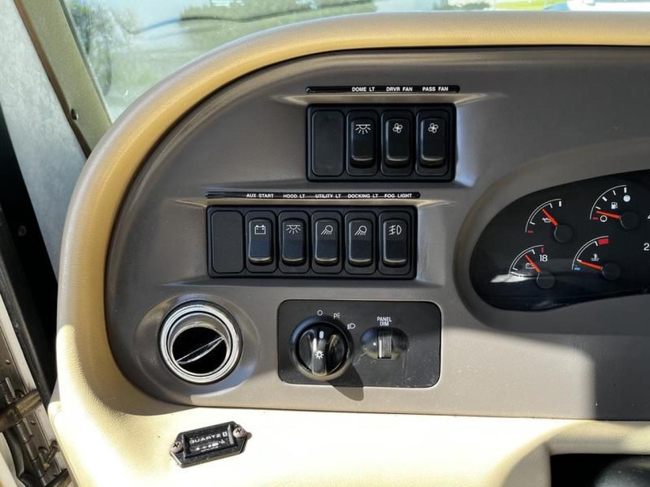 12576323