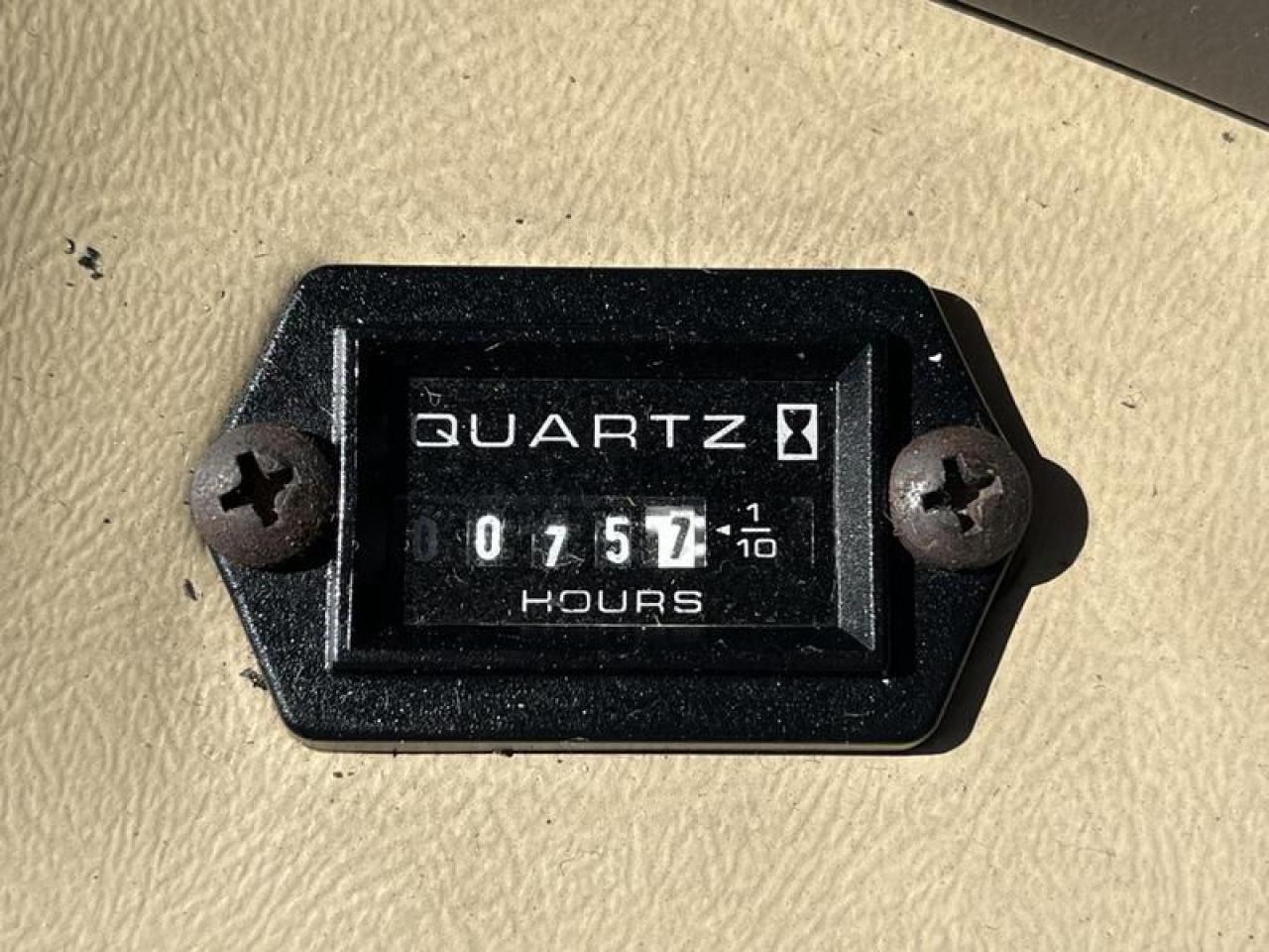 12576323