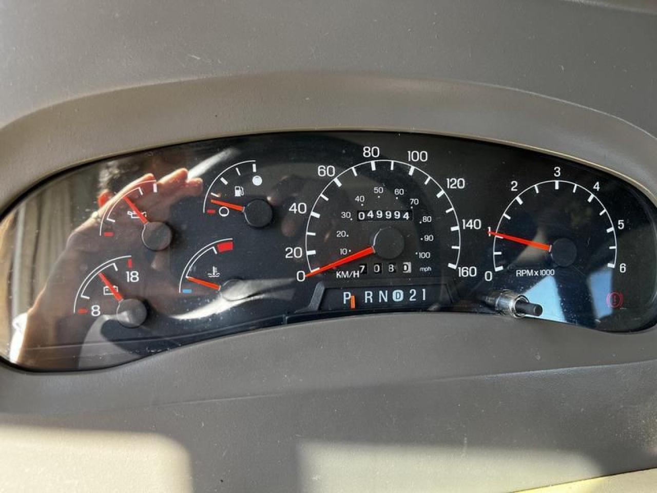 12576323