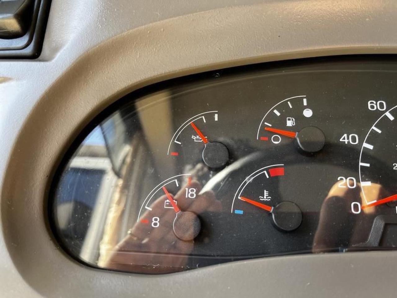 12576323