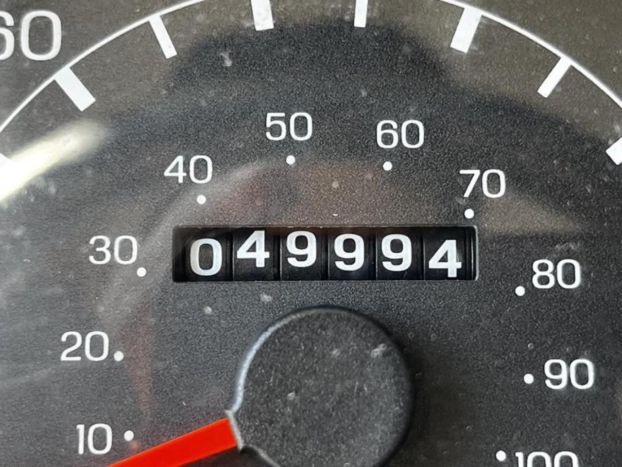 12576323