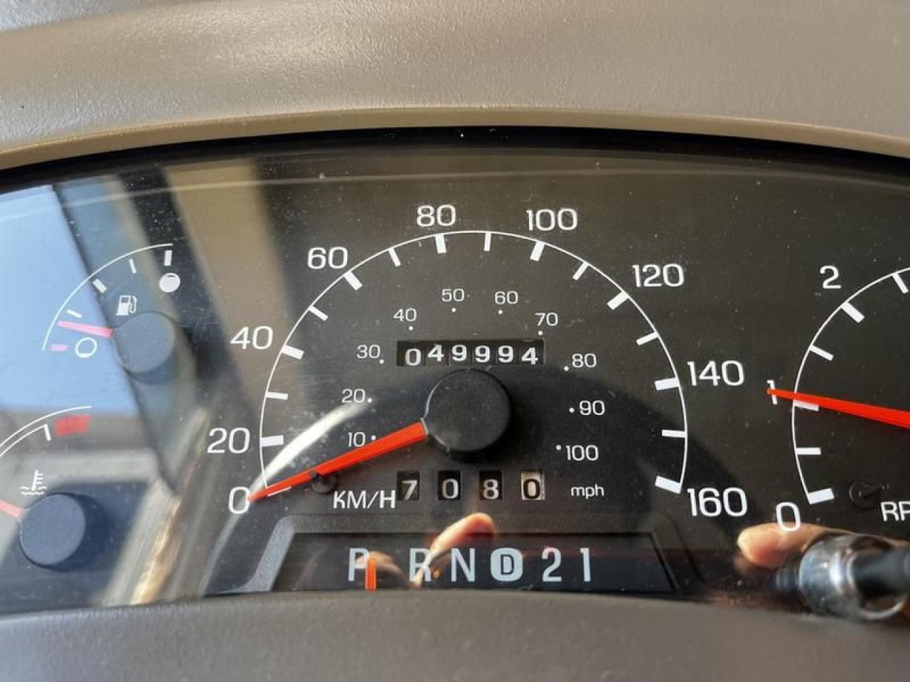 12576323