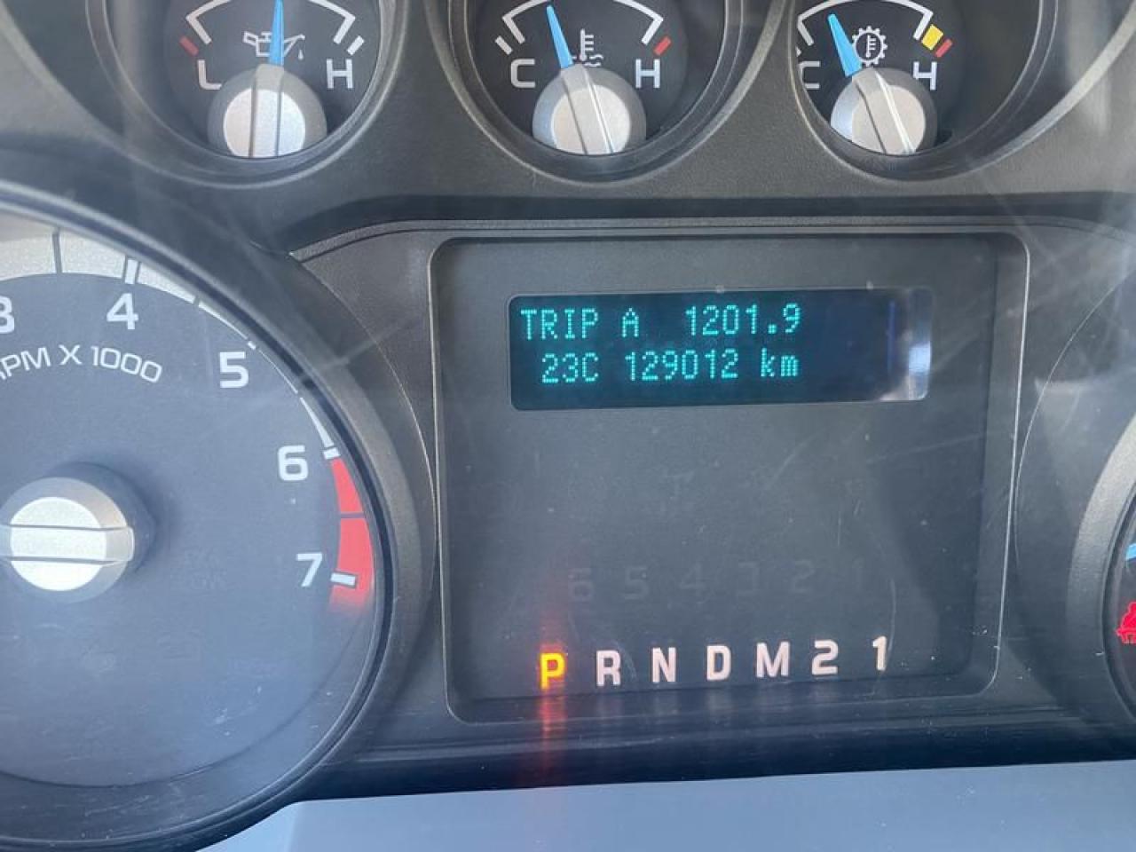 12576329