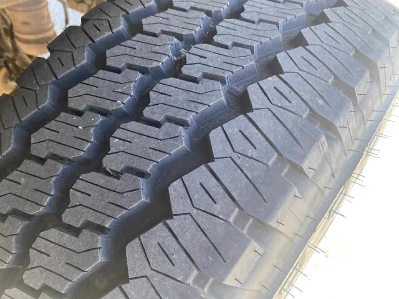 12576329