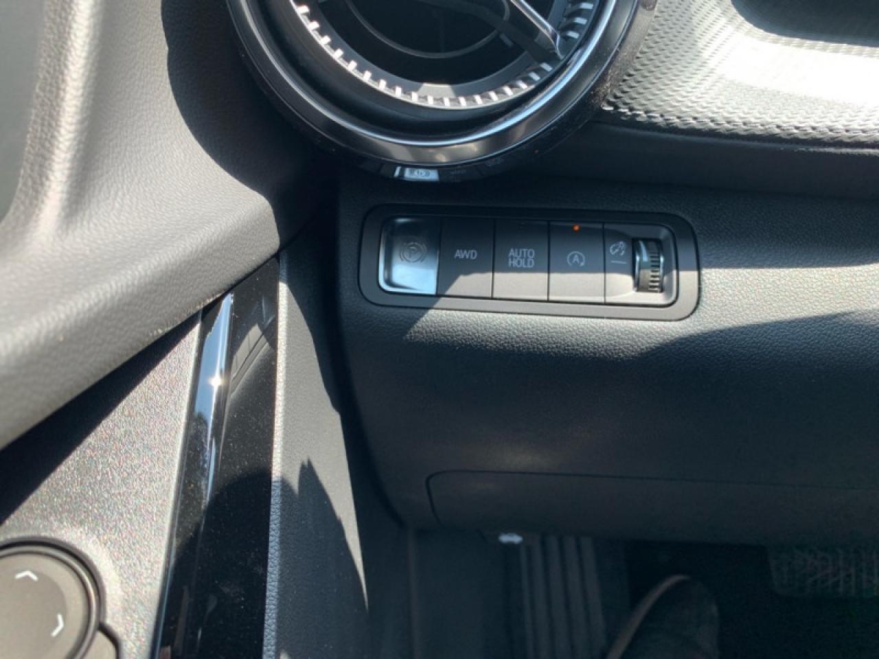 12576560