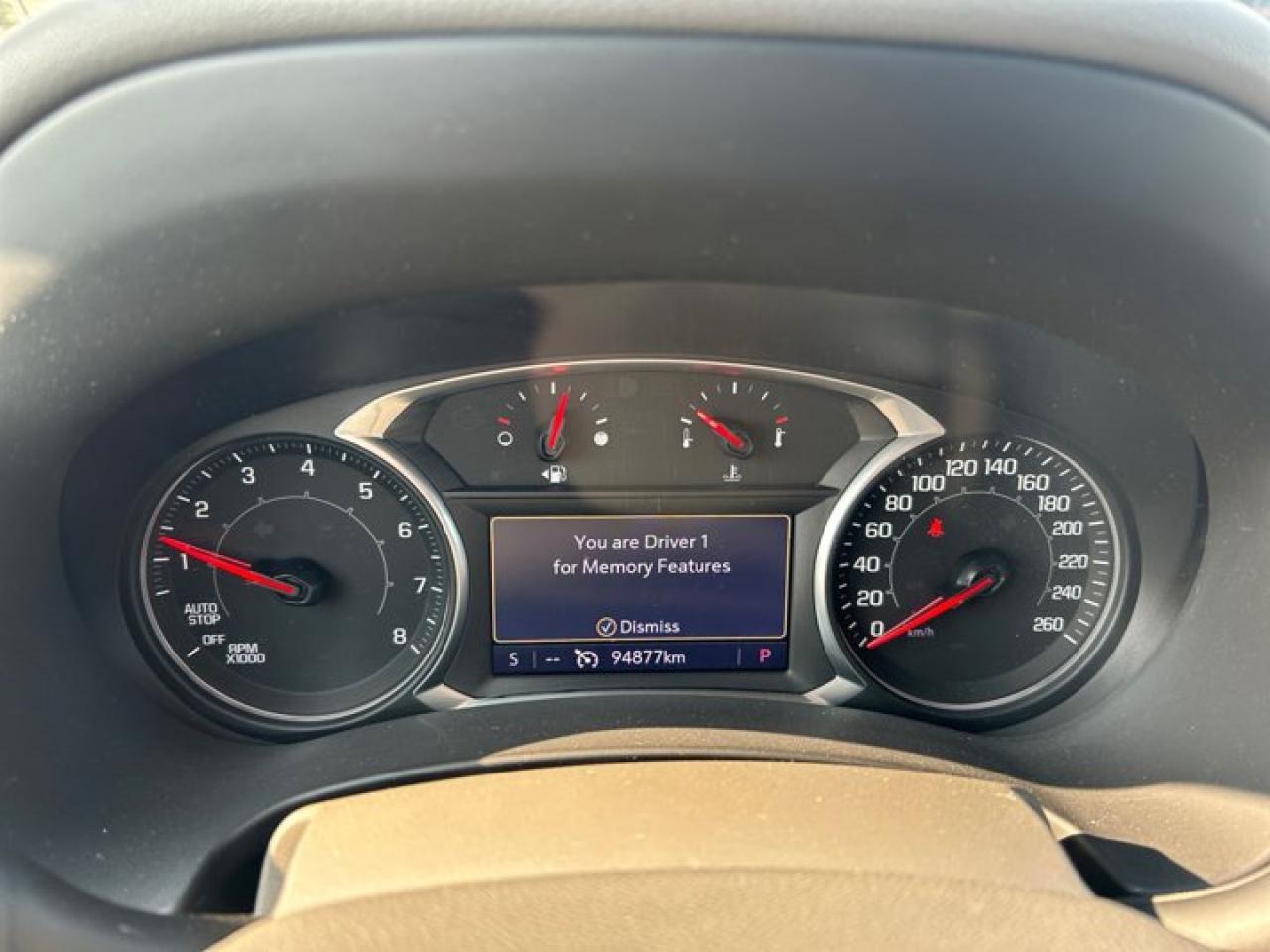 12577220