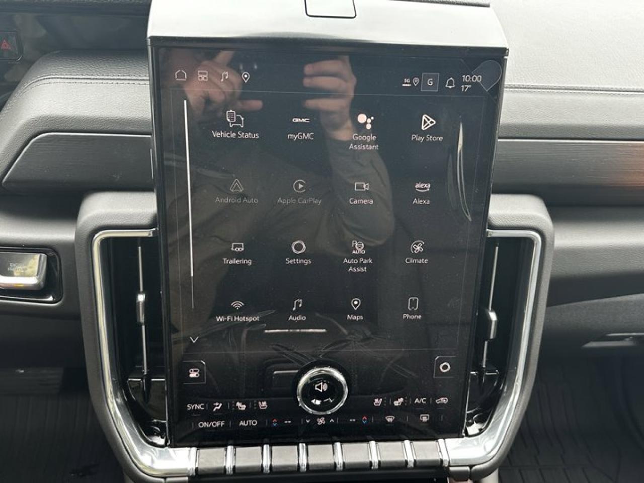 12577370