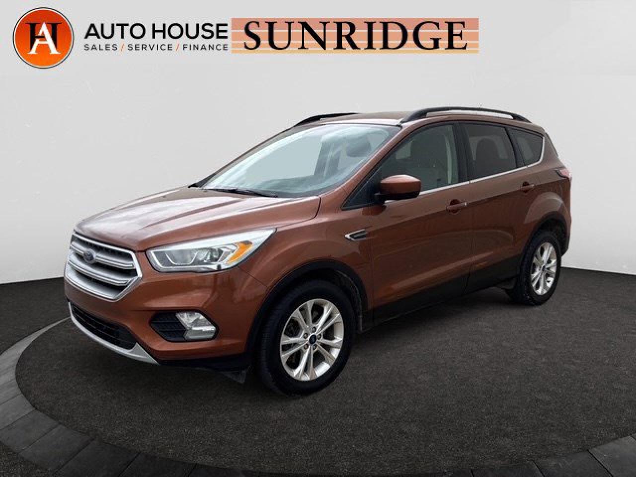 Used 2017 Ford Escape SE AWD NAVIGATION HEATED SEATS AND MIRRORS BLIND SPOT DETECTION BACKUP CAMERA for sale in Calgary, AB