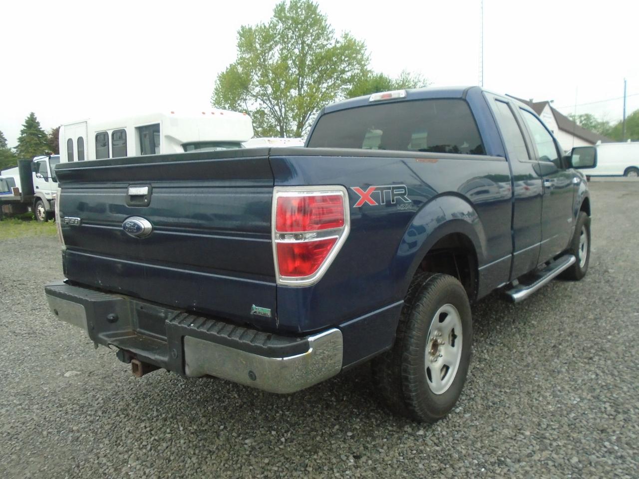 2013 Ford F-150 4WD SuperCab 145  Lariat - Photo #6